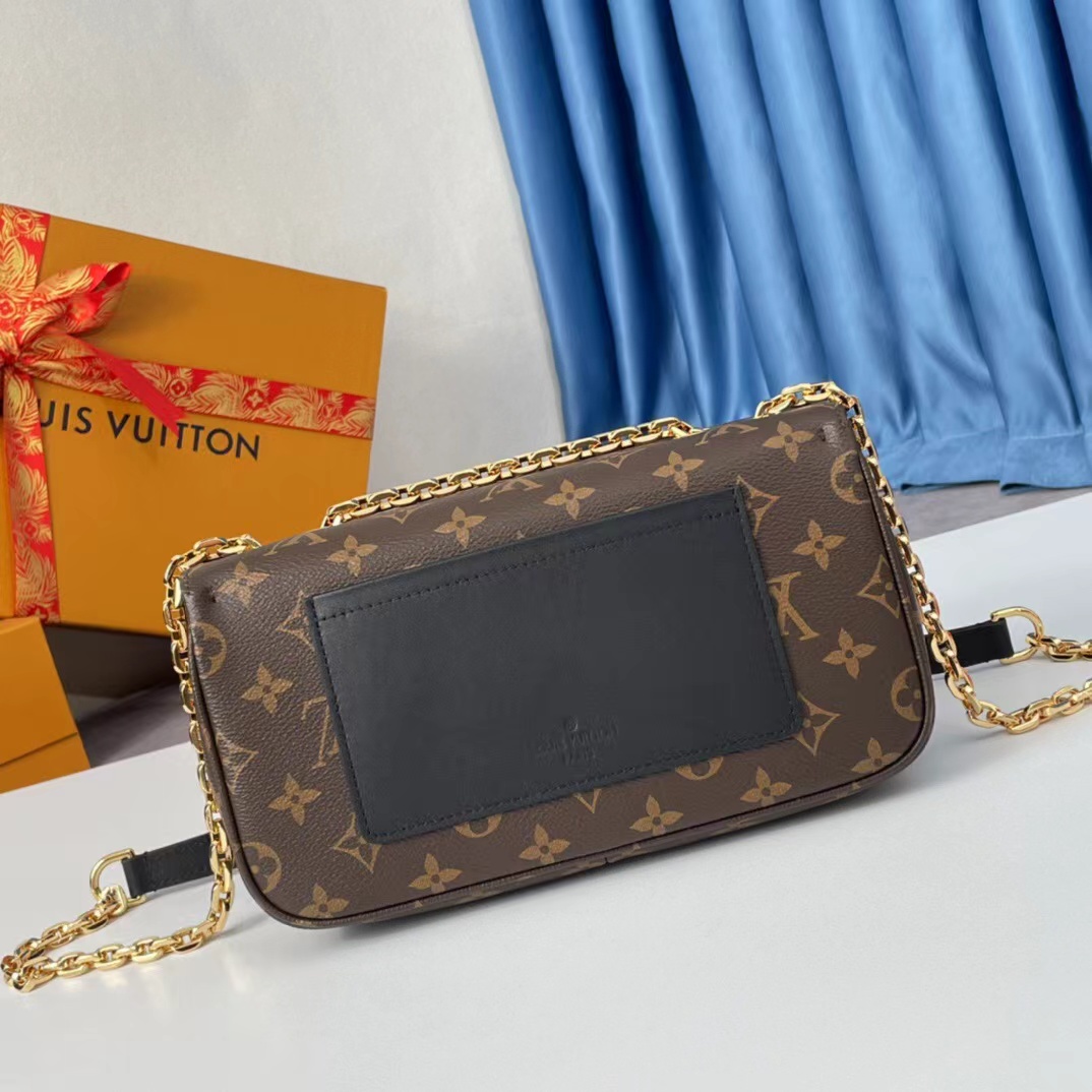 Louis Vuitton Pochette Métis East West marrom vista frontal